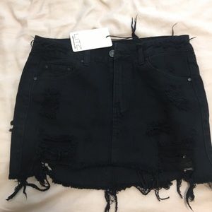 Black denim skirt